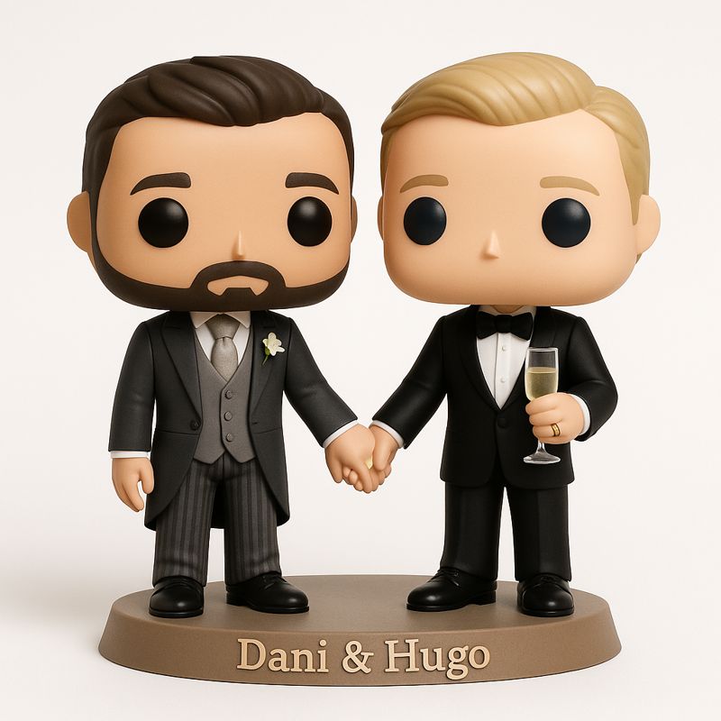 Two grooms in morning suit and tuxedo on an engraved base